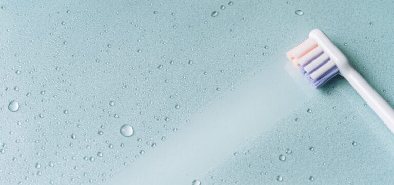 Dry and clean toothbrush marks on a glass surface